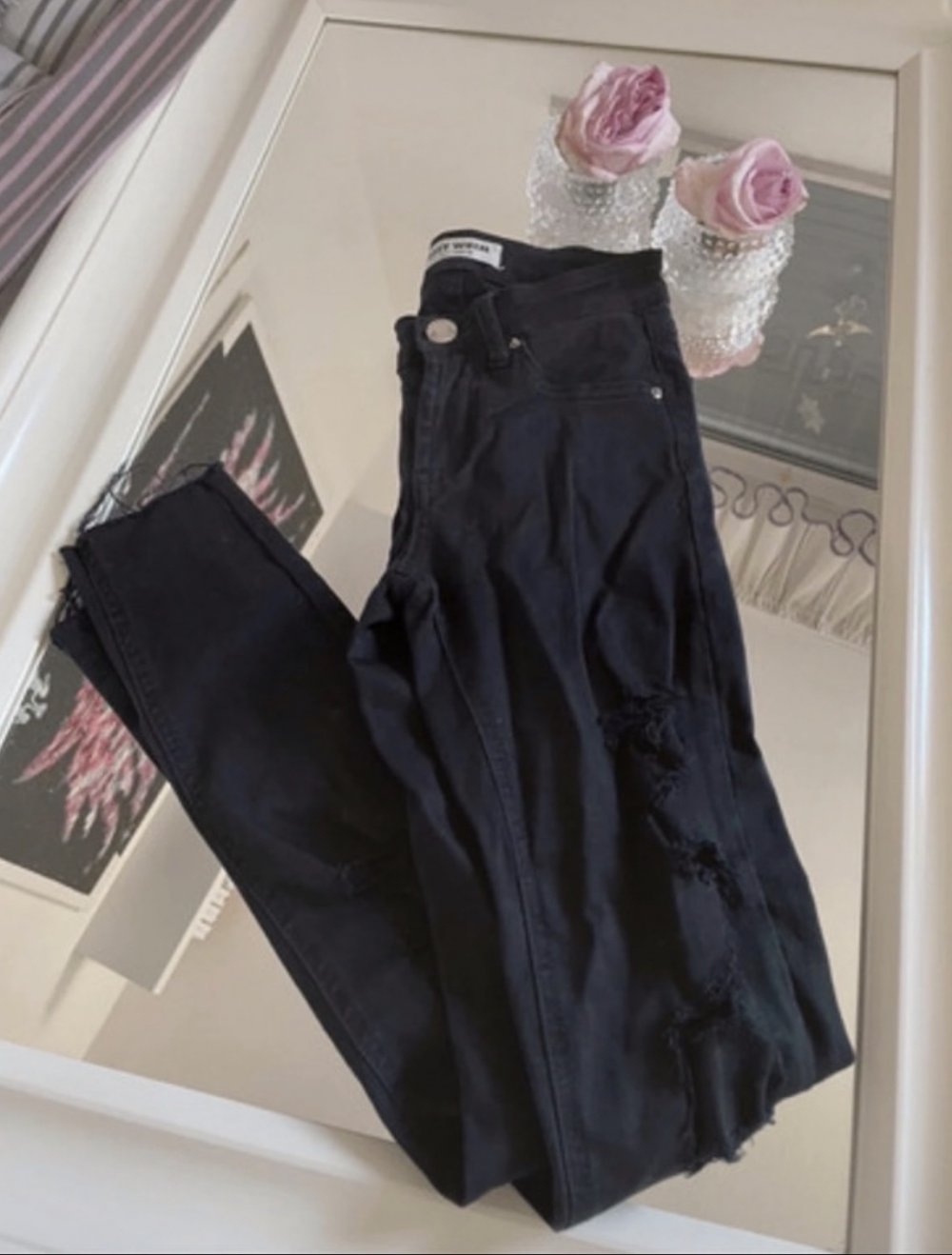 schwarze Jeans Hose mit Löchern