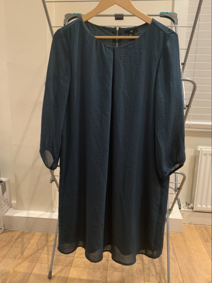 Dunkelgrünes Kleid