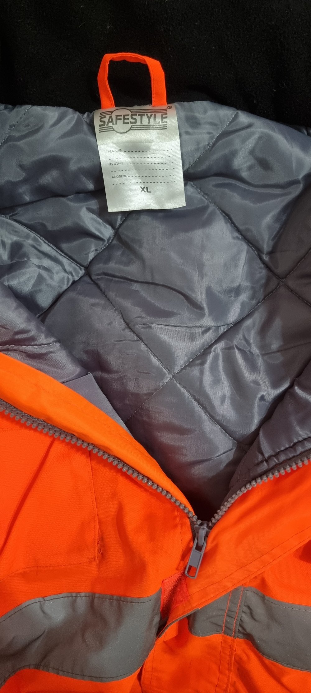Orangene Warnjacke in XL