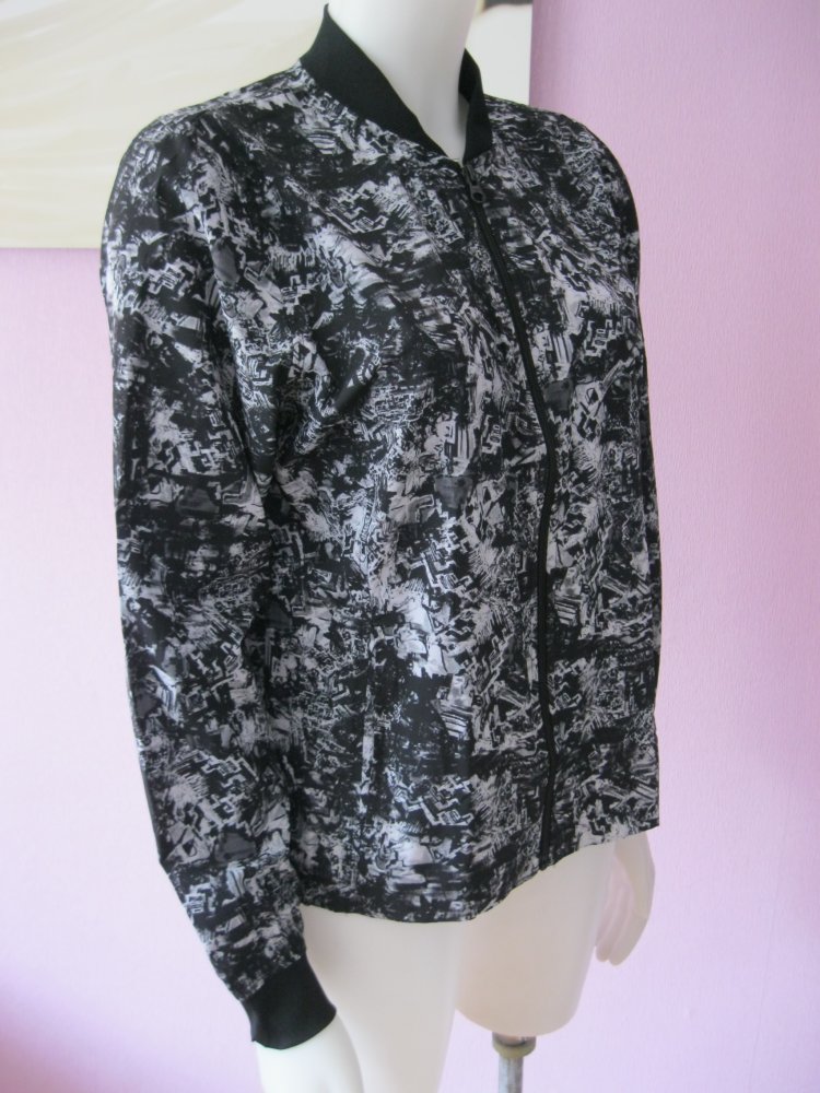 NEU # Crivit # leichte Jacke # Schwarz/Weiß gemustert # 40/42