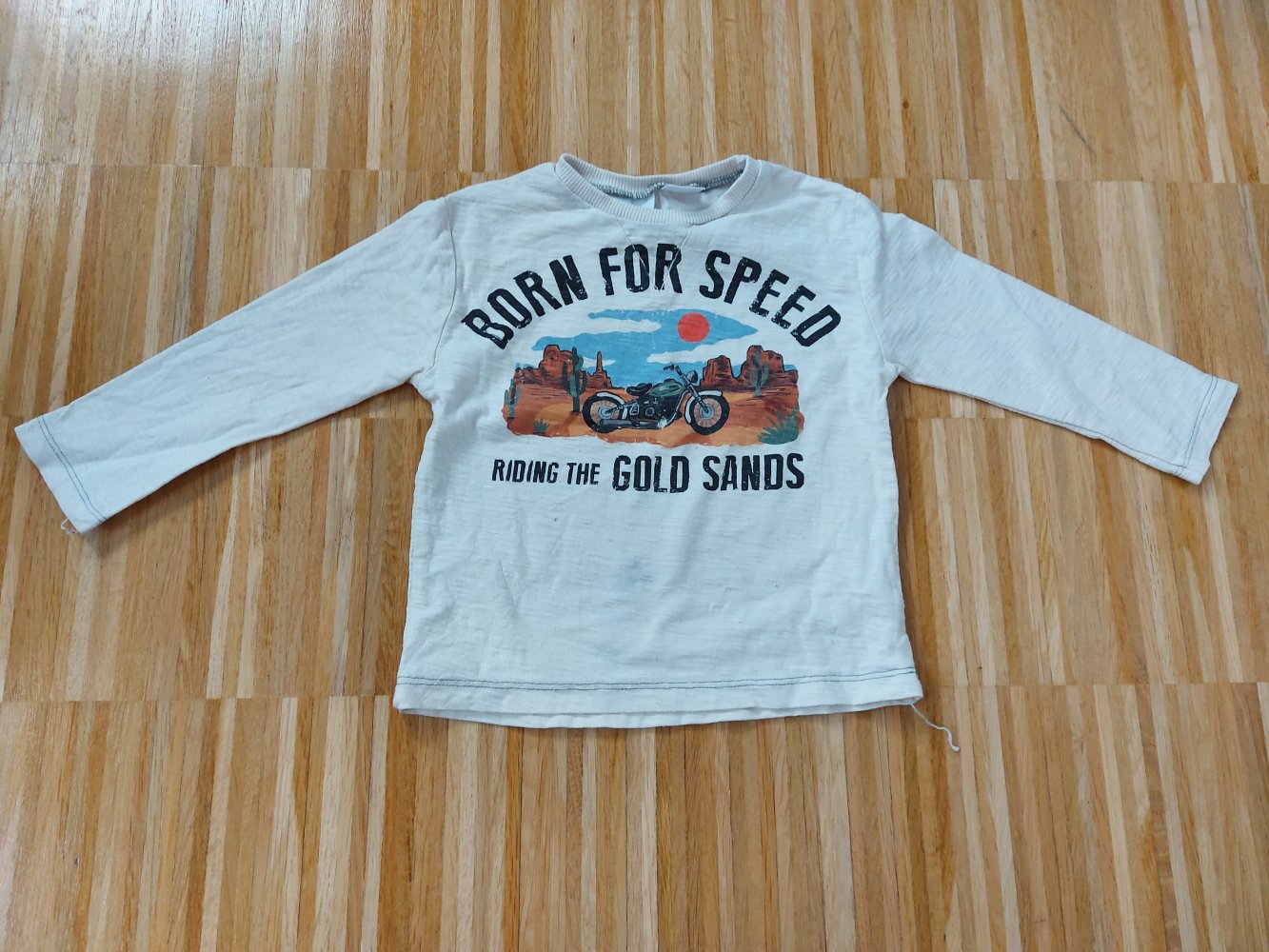 langärmliger cremeweißer Babypullover Born for Speed Gr. 80